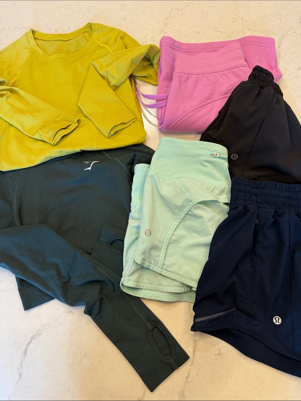 Lululemon Gymshark bundle. 4 shorts 2 long sleeve shirts size 2